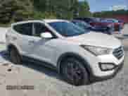 2014 Hyundai Santa Fe with VIN 5XYZU3LB7EG220229, listed as a Copart auction lot 81077865 with 187,468 mi miles and Clean title. Bid and sale history available at DreamBid. Image 4.