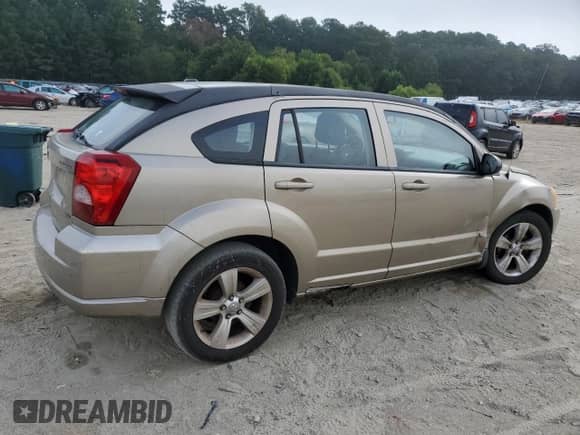 2010 Dodge Caliber SXT with VIN 1B3CB4HAXAD540088, listed as a Copart auction lot 68734845 with 153,998 mi miles and Salvage title. Bid and sale history available at DreamBid. Image 3.