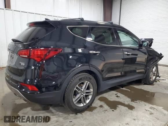 2017 Hyundai Santa Fe 2.4L z VIN 5NMZUDLB7HH001464, wystawiony jako Copart lot #82045805 z przebiegiem 118 615 mil mil oraz Szkoda całkowita • Salvage title. Historia ofert i sprzedaży dostępna na DreamBid. Obrazek 3.