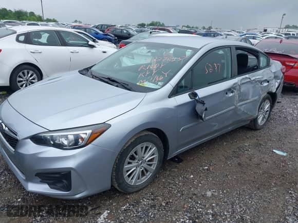 2017 Subaru Impreza Premium with VIN 4S3GKAD6XH3614545, listed as a IAAI auction lot 42275237 with 44,234 mi miles and . Bid and sale history available at DreamBid. Image 2.