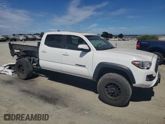 2019 Toyota Tacoma SR5 с VIN 3TMDZ5BN6KM058580, выставлен на аукционе Copart как лот 65633265 с пробегом 30 232 миль миль и Списание • Salvage title. История ставок и продаж доступна на DreamBid. Изображение 4.
