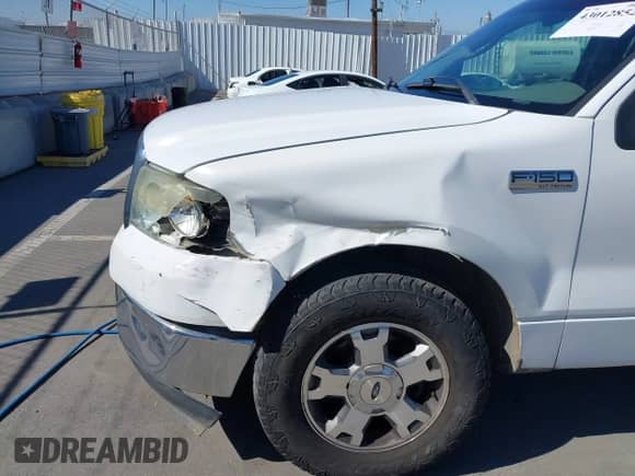 2007 Ford F-150 STX with VIN 1FTRX12W27KA70219, listed as a IAAI auction lot 43012852 with 302,519 mi miles and . Bid and sale history available at DreamBid. Image 6.