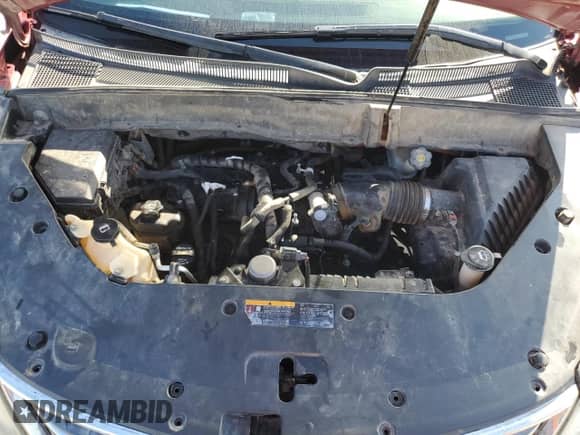 2014 Chevrolet Traverse LT z VIN 1GNKRHKD1EJ157302, wystawiony jako Copart lot #81863795 z przebiegiem 191 416 mil mil oraz Czysty tytuł • Clean title. Historia ofert i sprzedaży dostępna na DreamBid. Obrazek 12.