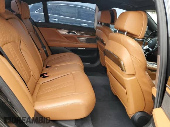2016 BMW 7 Series 750i with VIN WBA7F0C53GGM20760, listed as a Copart auction lot 57230334 with 77,588 mi miles and Salvage title. Bid and sale history available at DreamBid. Image 10.