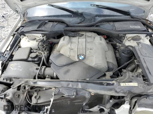 2004 BMW 7 Series 745i with VIN WBAGL63444DP70074, listed as a Copart auction lot 45068004 with Not provided miles and Salvage title. Bid and sale history available at DreamBid. Image 12.