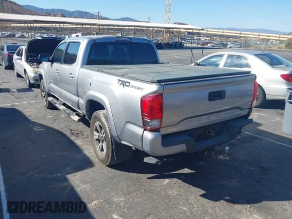 2017 Toyota Tacoma SR5 with VIN 3TMBZ5DNXHM006608, listed as a IAAI auction lot 43412044 with 114,937 mi miles and . Bid and sale history available at DreamBid. Image 3.