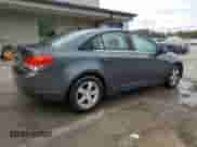 2013 Chevrolet Cruze 1LT z VIN 1G1PC5SB7D7229282, wystawiony jako Copart lot #85850445 z przebiegiem 122 534 mil mil oraz Szkoda całkowita • Salvage title. Historia ofert i sprzedaży dostępna na DreamBid. Obrazek 3.