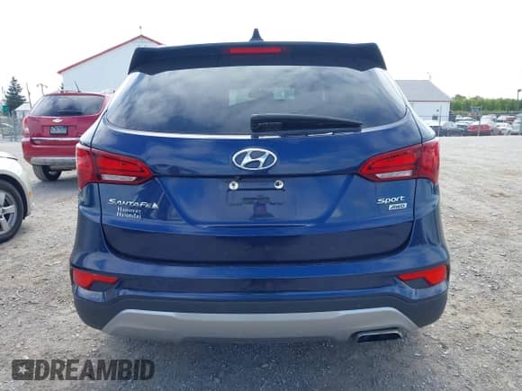 2018 Hyundai Santa Fe 2.4L with VIN 5XYZUDLB6JG513426, listed as a IAAI auction lot 43197740 with 79,487 mi miles and . Bid and sale history available at DreamBid. Image 16.