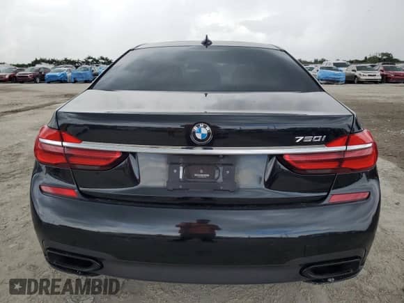 2019 BMW 7 Series 750i with VIN WBA7F0C53KGM25904, listed as a Copart auction lot 64657215 with 48,995 mi miles and Salvage title. Bid and sale history available at DreamBid. Image 6.