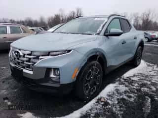 2022 Hyundai Santa Cruz SEL z VIN 5NTJCDAEXNH009197, wystawiony jako Copart lot #36265333 z przebiegiem 17 635 mil mil oraz . Historia ofert i sprzedaży dostępna na DreamBid. Obrazek 1.