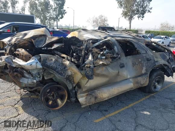 2000 Chevrolet Blazer LT with VIN 1GNCS13WXY2231878, listed as a IAAI auction lot 41212161 with Not provided miles and . Bid and sale history available at DreamBid. Image 6.