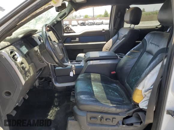 2013 Ford F-150 SVT Raptor z VIN 1FTFW1R61DFB34654, wystawiony jako Copart lot #65852775 z przebiegiem 154 907 mil mil oraz Szkoda całkowita • Salvage title. Historia ofert i sprzedaży dostępna na DreamBid. Obrazek 7.