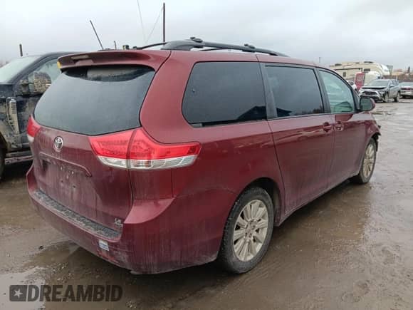 2014 Toyota Sienna LE with VIN 5TDJK3DC8ES083704, listed as a Copart auction lot 84932195 with 210,428 mi miles and Salvage title. Bid and sale history available at DreamBid. Image 3.
