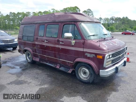 1994 Chevrolet Chevy Van with VIN 1GBEG25K4RF177057, listed as a IAAI auction lot 42090808 with 123,654 mi miles and . Bid and sale history available at DreamBid. Image 1.