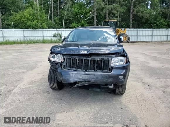 2012 Jeep Grand Cherokee Limited z VIN 1C4RJFBG4CC217832, wystawiony jako Copart lot #64059795 z przebiegiem 113 251 mil mil oraz Szkoda całkowita • Salvage title. Historia ofert i sprzedaży dostępna na DreamBid. Obrazek 14.