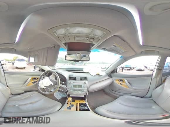 2007 Toyota Camry XLE z VIN 4T1BE46K97U525115, wystawiony jako Copart lot #81422485 z przebiegiem 189 435 mil mil oraz Szkoda całkowita • Salvage title. Historia ofert i sprzedaży dostępna na DreamBid. Obrazek 14.