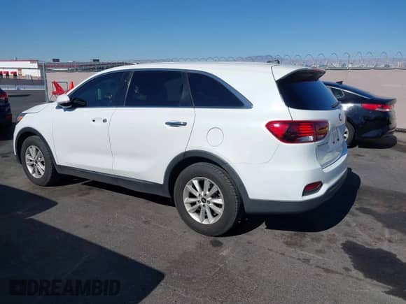 2019 Kia Sorento LX with VIN 5XYPG4A55KG554000, listed as a IAAI auction lot 42816836 with 107,585 mi miles and . Bid and sale history available at DreamBid. Image 3.