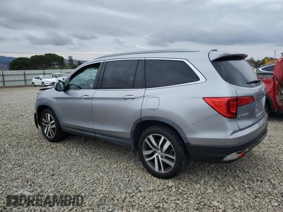 2016 Honda Pilot Elite с VIN 5FNYF6H06GB121720, выставлен на аукционе Copart как лот 81529435 с пробегом 127 907 миль миль и Списание • Salvage title. История ставок и продаж доступна на DreamBid. Изображение 2.