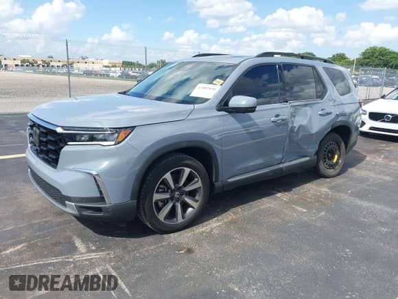 2024 Honda Pilot Elite with VIN 5FNYG1H84RB015114, listed as a IAAI auction lot 43082030 with 26,877 mi miles and . Bid and sale history available at DreamBid. Image 18.