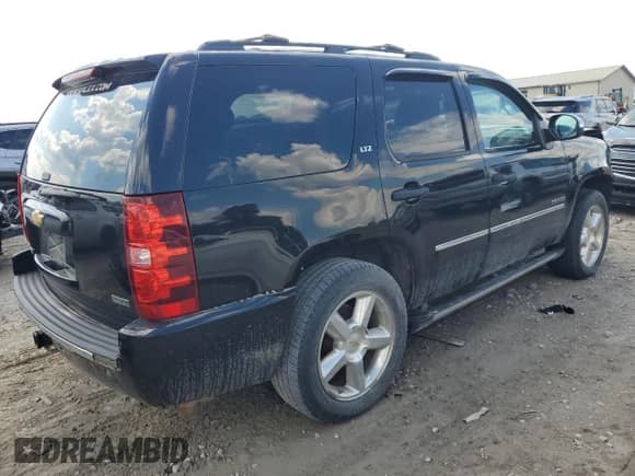 2010 Chevrolet Tahoe LTZ с VIN 1GNUKCE01AR158387, выставлен на аукционе Copart как лот 68820795 с пробегом 214 764 миль миль и Списание • Salvage title. История ставок и продаж доступна на DreamBid. Изображение 3.