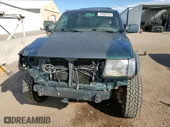 2000 Toyota Tacoma с VIN 4TAWN72N6YZ622408, выставлен на аукционе Copart как лот 81862725 с пробегом 275 084 миль миль и Списание • Salvage title. История ставок и продаж доступна на DreamBid. Изображение 14.