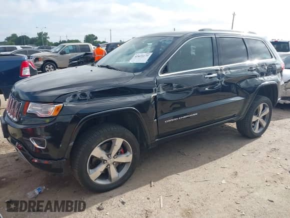 2015 Jeep Grand Cherokee High Altitude z VIN 1C4RJFCT1FC740242, wystawiony jako IAAI lot #42839179 z przebiegiem 121 830 mil mil oraz . Historia ofert i sprzedaży dostępna na DreamBid. Obrazek 2.