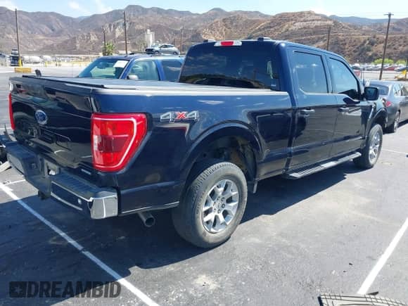 2023 Ford F-150 XLT с VIN 1FTFW1E89PKE05060, выставлен на аукционе IAAI как лот 43299204 с пробегом 79 389 миль миль и . История ставок и продаж доступна на DreamBid. Изображение 4.