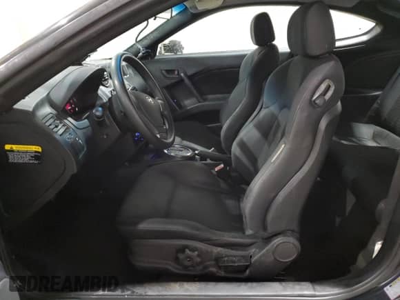 2008 Hyundai Tiburon GS with VIN KMHHM66D48U265282, listed as a Copart auction lot 77391204 with 77,088 mi miles and Salvage title. Bid and sale history available at DreamBid. Image 7.