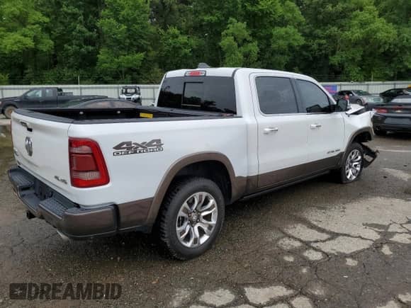 2020 Ram 1500 Longhorn with VIN 1C6SRFKTXLN136868, listed as a Copart auction lot 60429505 with 52,310 mi miles and Salvage title. Bid and sale history available at DreamBid. Image 3.