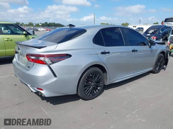 2021 Toyota Camry SE with VIN 4T1G11AK2MU445593, listed as a IAAI auction lot 43385464 with 57,907 mi miles and . Bid and sale history available at DreamBid. Image 4.