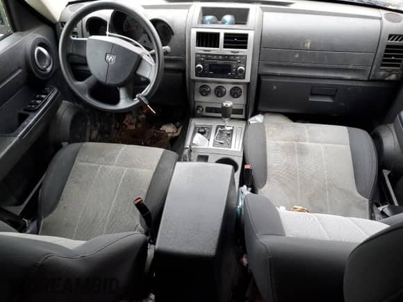 2008 Dodge Nitro SXT с VIN 1D8GU28K98W181713, выставлен на аукционе Copart как лот 65026314 с пробегом 196 031 миль миль и Списание • Salvage title. История ставок и продаж доступна на DreamBid. Изображение 8.