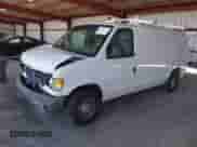 2005 Ford Econoline Cargo with VIN 1FTRE14W15HA51576, listed as a IAAI auction lot 42908712 with 210,991 mi miles and . Bid and sale history available at DreamBid. Image 2.