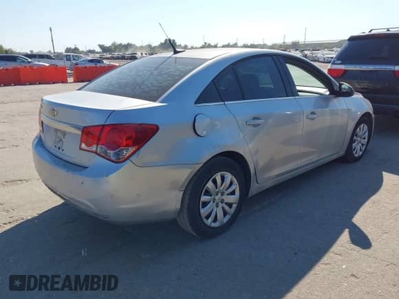 2011 Chevrolet Cruze LS with VIN 1G1PC5SH4B7220105, listed as a IAAI auction lot 43474662 with 115,046 mi miles and . Bid and sale history available at DreamBid. Image 4.