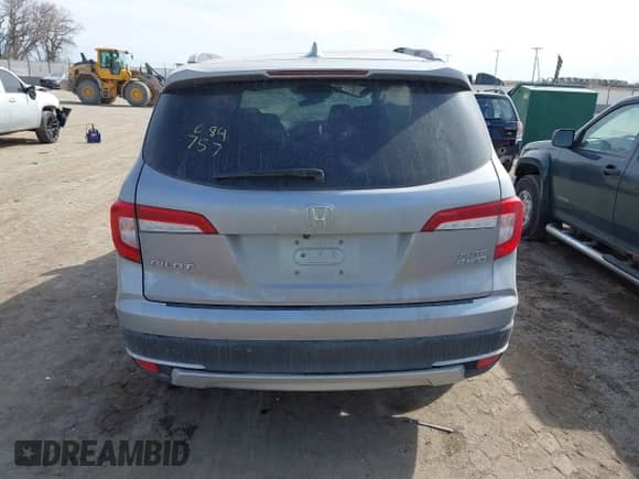 2021 Honda Pilot Elite z VIN 5FNYF6H00MB085678, wystawiony jako IAAI lot #41783075 z przebiegiem Nie podano mil oraz . Historia ofert i sprzedaży dostępna na DreamBid. Obrazek 16.