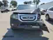 2011 Honda Pilot Touring with VIN 5FNYF3H9XBB041665, listed as a Copart auction lot 70728095 with 198,665 mi miles and Salvage title. Bid and sale history available at DreamBid. Image 5.