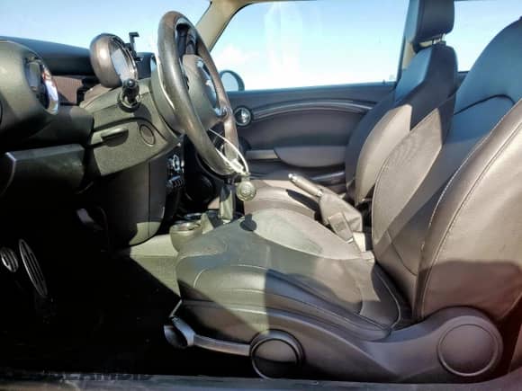 2012 MINI Hardtop S with VIN WMWSV3C50CTY25944, listed as a Copart auction lot 62837575 with 73,618 mi miles and Salvage title. Bid and sale history available at DreamBid. Image 7.