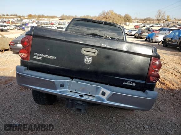 2005 Dodge Dakota SLT z VIN 1D7HW48K45S139614, wystawiony jako Copart lot #83898134 z przebiegiem 200 188 mil mil oraz Szkoda całkowita • Salvage title. Historia ofert i sprzedaży dostępna na DreamBid. Obrazek 6.