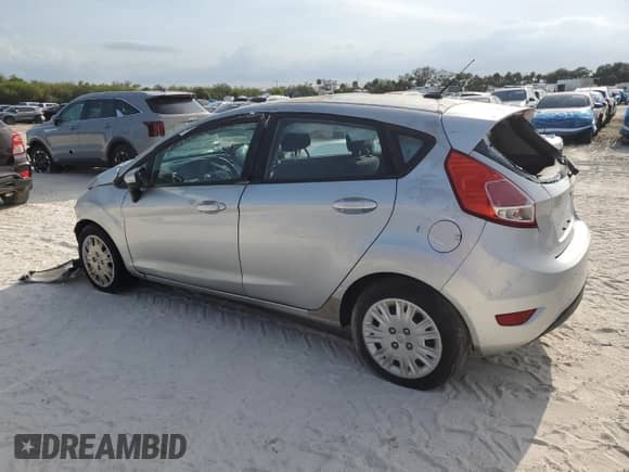 2016 Ford Fiesta S with VIN 3FADP4TJ9GM170699, listed as a Copart auction lot 59528543 with 96,394 mi miles and Salvage title. Bid and sale history available at DreamBid. Image 2.