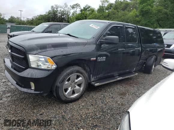 2014 Ram 1500 Tradesman z VIN 1C6RR6FT5ES113155, wystawiony jako Copart lot #56291695 z przebiegiem 154 792 mil mil oraz Szkoda całkowita • Salvage title. Historia ofert i sprzedaży dostępna na DreamBid. Obrazek 1.