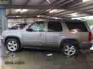 2014 Chevrolet Tahoe LS with VIN 1GNSCAE04ER101213, listed as a IAAI auction lot 41904821 with 155,133 mi miles and . Bid and sale history available at DreamBid. Image 14.