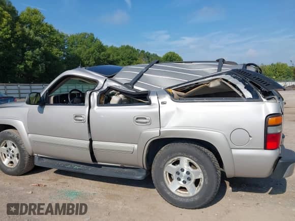 2005 Chevrolet Tahoe LT with VIN 1GNEC13T85R177219, listed as a IAAI auction lot 42970376 with 210,481 mi miles and . Bid and sale history available at DreamBid. Image 6.