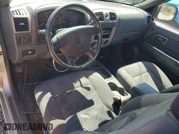 2005 Chevrolet Colorado Z71 z VIN 1GCDT196658170295, wystawiony jako Copart lot #63085365 z przebiegiem 215 432 mil mil oraz Szkoda całkowita • Salvage title. Historia ofert i sprzedaży dostępna na DreamBid. Obrazek 8.