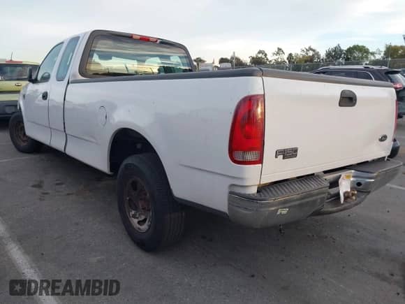2004 Ford F-150 XL with VIN 2FTRX17W84CA43289, listed as a IAAI auction lot 41248462 with Not provided miles and . Bid and sale history available at DreamBid. Image 3.