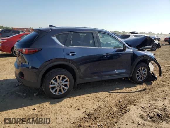 2023 Mazda CX-5 S Carbon Edition z VIN JM3KFBCM7P0281233, wystawiony jako Copart lot #68305995 z przebiegiem 29 947 mil mil oraz Szkoda całkowita • Salvage title. Historia ofert i sprzedaży dostępna na DreamBid. Obrazek 3.
