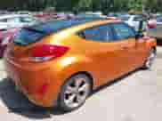 2013 Hyundai Veloster w/Black Int z VIN KMHTC6AD8DU175373, wystawiony jako IAAI lot #42567057 z przebiegiem 141 693 mil mil oraz . Historia ofert i sprzedaży dostępna na DreamBid. Obrazek 4.