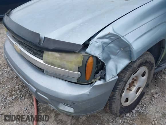 2006 Chevrolet TrailBlazer LT z VIN 1GNDS13S462338763, wystawiony jako IAAI lot #43145852 z przebiegiem 147 745 mil mil oraz . Historia ofert i sprzedaży dostępna na DreamBid. Obrazek 6.