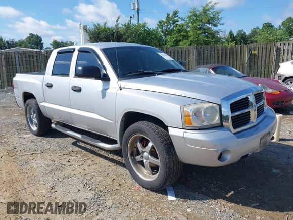 2006 Dodge Dakota SLT with VIN 1D7HE48K76S610868, listed as a IAAI auction lot 42542808 with 244,951 mi miles and . Bid and sale history available at DreamBid. Image 1.