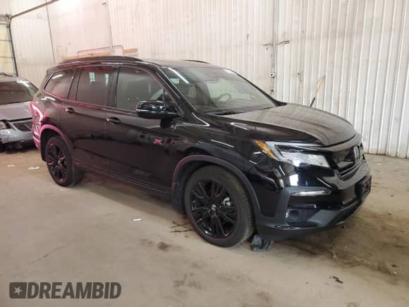 2022 Honda Pilot Black Edition with VIN 5FNYF6H74NB031881, listed as a Copart auction lot 71475495 with 58,040 mi miles and Salvage title. Bid and sale history available at DreamBid. Image 4.