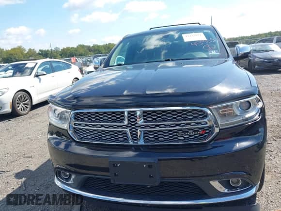 2016 Dodge Durango Citadel with VIN 1C4RDJEG0GC370090, listed as a IAAI auction lot 43245951 with 129,152 mi miles and . Bid and sale history available at DreamBid. Image 12.