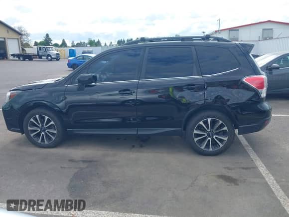 2018 Subaru Forester Premium with VIN JF2SJGECXJH524164, listed as a IAAI auction lot 42193260 with 172,304 mi miles and . Bid and sale history available at DreamBid. Image 14.